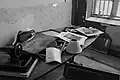 Desk displaying various artifacts