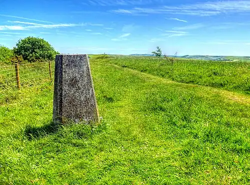 Trig Point on Kithurst Hill West Sussex located on the South Downs Way above the village of Storrington, 213 metres (699 ft) high at the summit.
