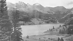 Lake with mountains in background