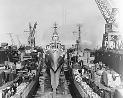 USS ABSD-2 at Manus on 2 December 1944 repaired both the USS Canberra (CA-70) at right, and USS Killen (DD-593) after battle damage off Leyte