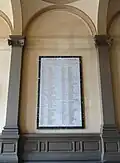 World War II commemorative plaque inside the Palace