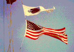 Jewish Worship Pennant, flying over the National Ensign (American flag) on a United States Navy ship[150]