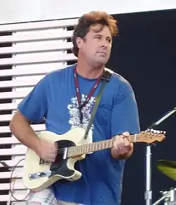 Vince Gill playing an electric guitar