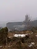 View of the fort from Wollseifen. Pollution in the foreground