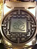 Waffle iron with logo of Country Inns & Suites, advertising the company logo on waffles made by customers