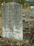 Detail of one of the older graves in the cemetery