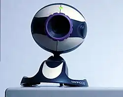 Image 39Typical low-cost webcam used with many personal computers (from History of videotelephony)