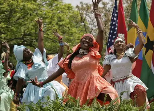Photo of dancing African women