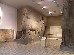 Room 10 – Human Headed Winged Bulls from Khorsabad, companion pieces in the Musée du Louvre, Iraq, 710–705 BC