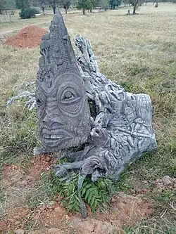 Modern wood carving at the entrance of the Great Zimbabwe
