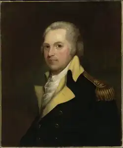 Portrait shows a white-haired man in a dark blue military coat with buff lapels and gold epaulettes.